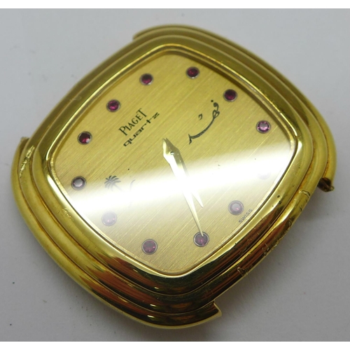 1256 - An 18ct gold Piaget quartz wristwatch, with 'crown' on the case back, 75121/316225, total weight 35.... 