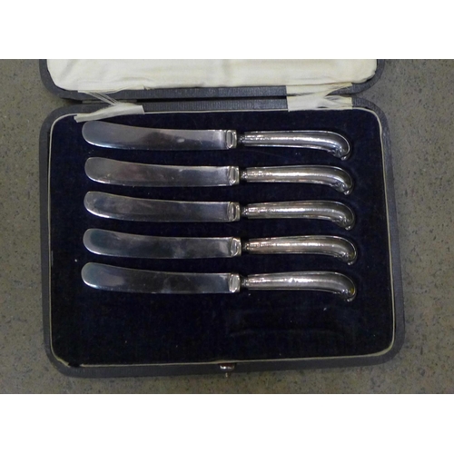 1271B - Five silver handled knives, cased and two sets of flatware