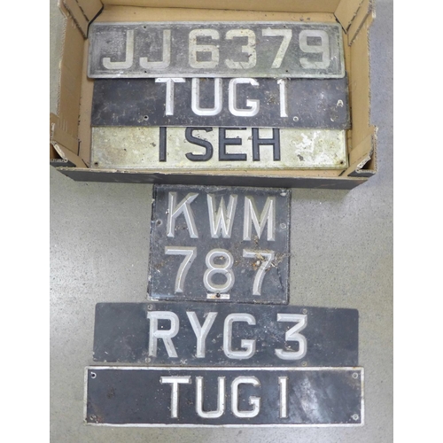 1272 - Six vintage metal and enamel car number plates; includes a pair, 'TUG1' and four others **PLEASE NOT... 