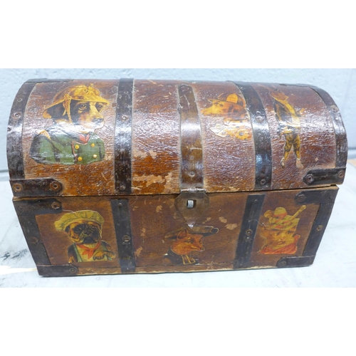 1280D - A wooden domed top box with decoupage scraps