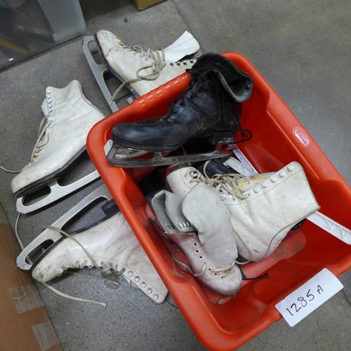 1285A - Three pairs of ice skating boots and one spare, a Daly of Glasgow hat box, a pair of candlesticks an... 