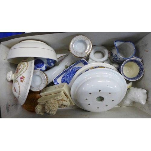 1286B - Two boxes of china including a wall plaque, a salad drainer and a modern blue and white biscuit barr... 