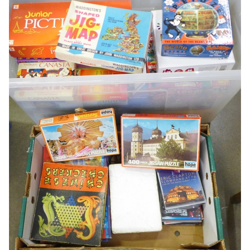 1296 - A collection of board games and jigsaw puzzles, Harry Potter Scene It?, Junior Pictionary, Logo boar... 