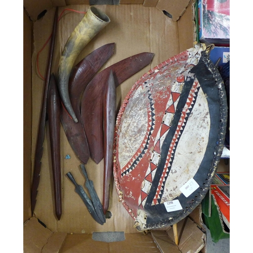 1298 - Two wooden boomerangs, two metal spear tips, a painted shield, horn and two wooden stakes **PLEASE N... 