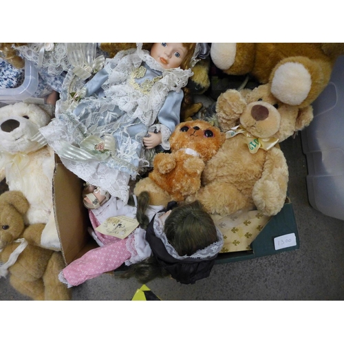 1300 - A box of soft toys and plastic dinosaur figures and two composition dolls in parts, a Woody doll (no... 