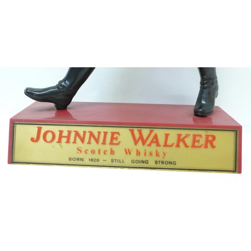 613 - A Harry E Tunnicliffe Mica Products Johnnie Walker plastic advertising figure, 40cm, (left arm a/f)