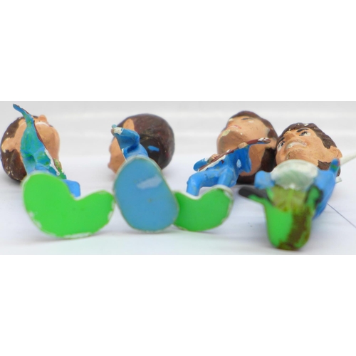 666 - A set of four plastic Beatles figures