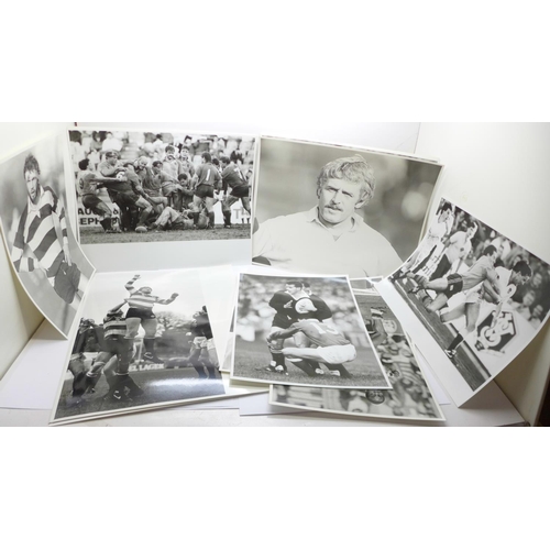 670 - A collection of thirty-three Rugby black and white press photographs