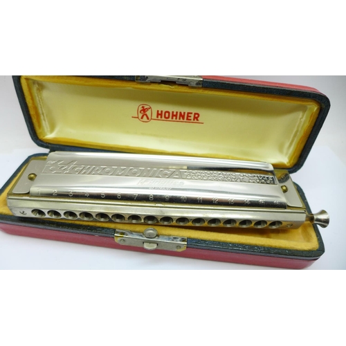 671 - A Hohner The 64 Chromonica Professional model harmonica, cased