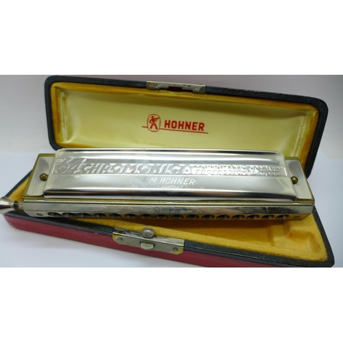 671 - A Hohner The 64 Chromonica Professional model harmonica, cased