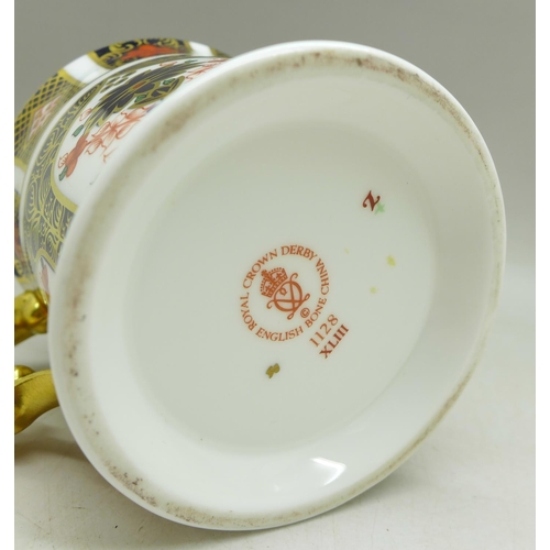 689 - A Royal Crown Derby 1128 pattern loving cup