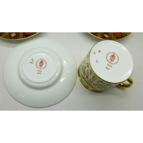 695 - A set of six Royal Crown Derby 1128 pattern coffee cans and saucers