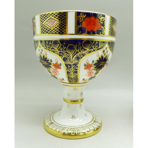 697 - A Royal Crown Derby 1128 pattern goblet and a cup