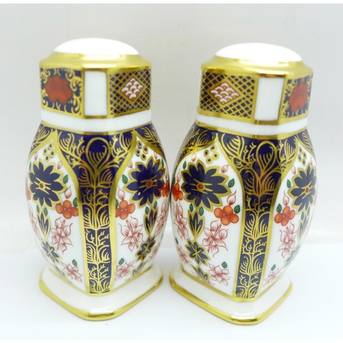 703 - A Royal Crown Derby 1128 pattern three piece cruet set