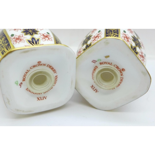 703 - A Royal Crown Derby 1128 pattern three piece cruet set