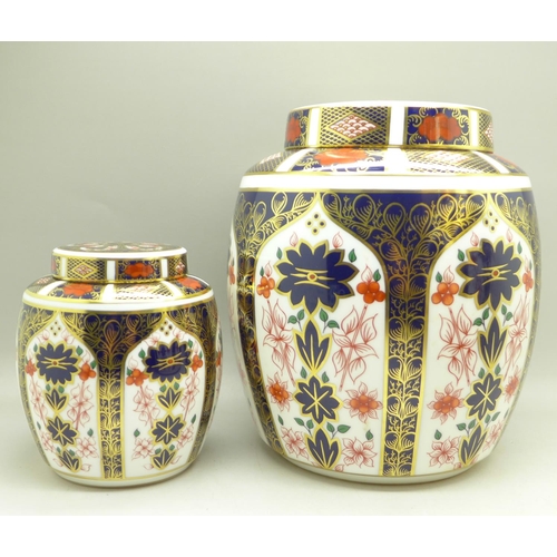 707 - A graduated set of three Royal Crown Derby 1128 pattern ginger jars, largest stained inside