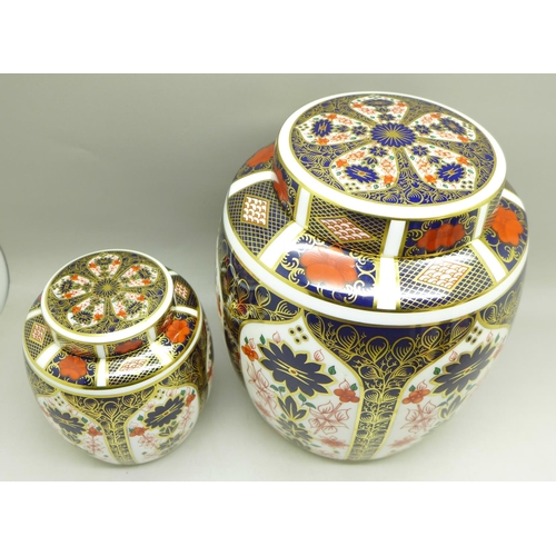 707 - A graduated set of three Royal Crown Derby 1128 pattern ginger jars, largest stained inside