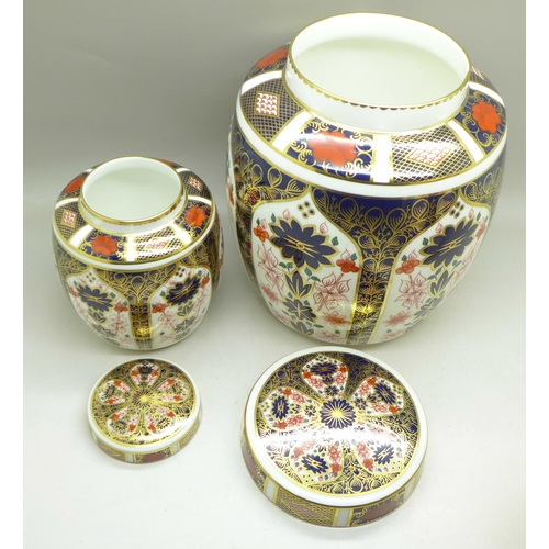 707 - A graduated set of three Royal Crown Derby 1128 pattern ginger jars, largest stained inside