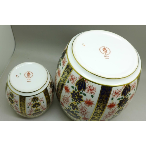 707 - A graduated set of three Royal Crown Derby 1128 pattern ginger jars, largest stained inside