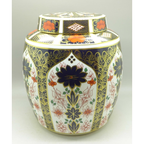 707 - A graduated set of three Royal Crown Derby 1128 pattern ginger jars, largest stained inside