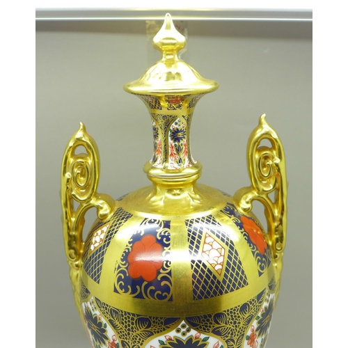 708 - A Royal Crown Derby 1128 pattern urn, 30cm