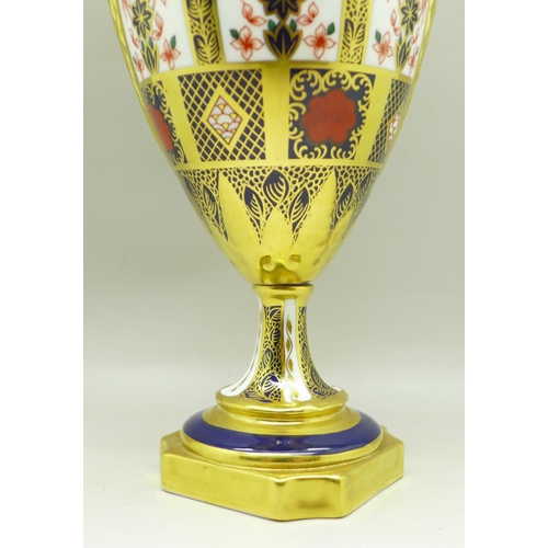 708 - A Royal Crown Derby 1128 pattern urn, 30cm