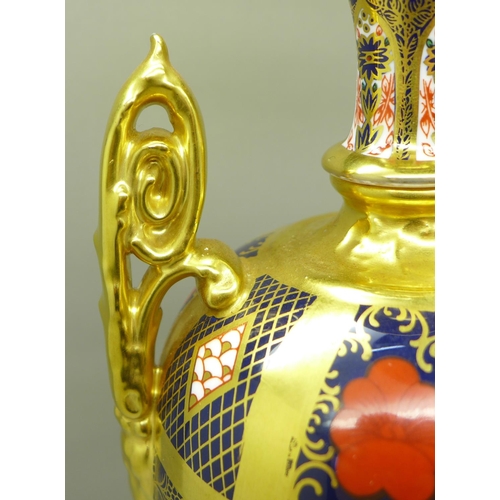 708 - A Royal Crown Derby 1128 pattern urn, 30cm