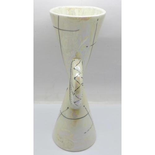 716 - An Anita Harris trial piece Yo-Yo vase in mottled cream lustre, 20cm, signed in gold on the base