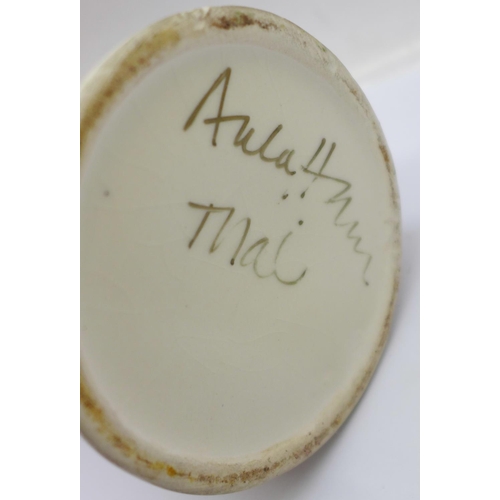 716 - An Anita Harris trial piece Yo-Yo vase in mottled cream lustre, 20cm, signed in gold on the base