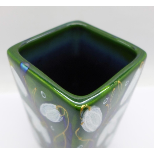 724 - An Anita Harris studio pottery square vase in the Snowdrop design, 11cm, signed in gold on the base