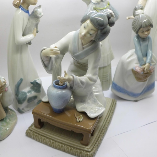 742 - Two Lladro figures, a/f, three Nao figures, two a/f, and two others