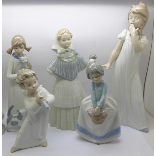 742 - Two Lladro figures, a/f, three Nao figures, two a/f, and two others