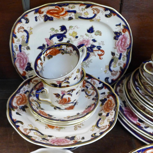 743 - A collection of Mason's Mandalay Ironstone, four cups and saucers, a cream jug, ten various plates, ... 