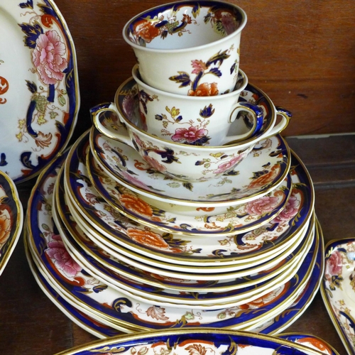 743 - A collection of Mason's Mandalay Ironstone, four cups and saucers, a cream jug, ten various plates, ... 