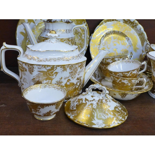 744 - Royal Crown Derby Gold Aves tea ware, teapot, coffee pot, six cups, six saucers (5+1), two large pla... 