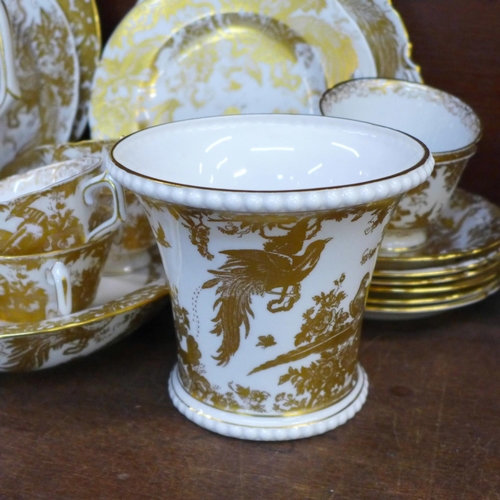 744 - Royal Crown Derby Gold Aves tea ware, teapot, coffee pot, six cups, six saucers (5+1), two large pla... 