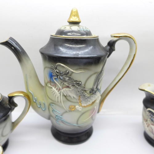 747 - An oriental six setting tea set with Geisha girl base in the cups, one saucer a/f