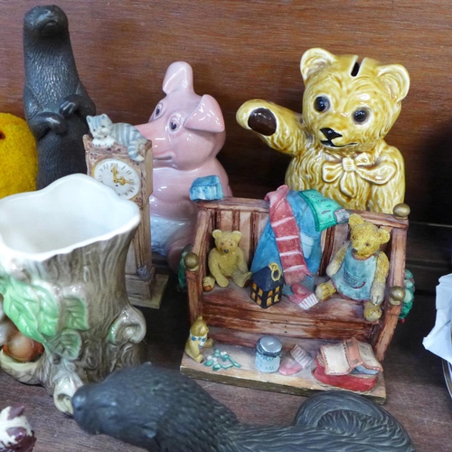 752 - Two resin figures of otters, eight Peter Jones resin comical cat and other ornaments, a Sandland Ted... 