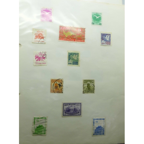 771 - Stamps:- China stamps, postal history, postal stationery, first day covers, etc., in file