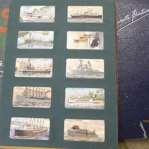 775 - A collection of nine complete cigarette card albums of genuine vintage cigarette cards, from 1915 on... 