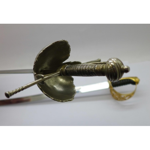 784 - A novelty sword letter opener and one other sword for display