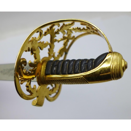 784 - A novelty sword letter opener and one other sword for display