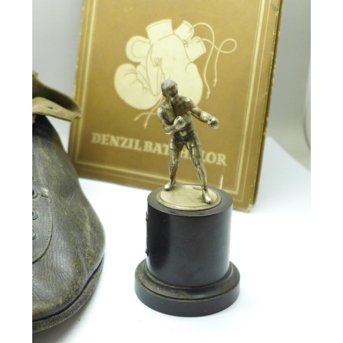 788 - A pair of boxing shoes, a boxing trophy (1951) and book