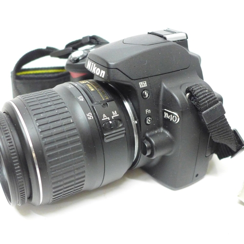 791 - A Nikon D40 camera with Nikon 18-55mm lens, a Nikon battery charger, battery and remote