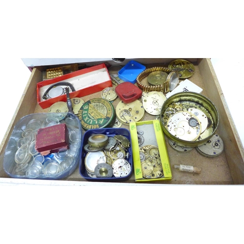 794 - A wood cabinet of mixed watch parts and watch materials