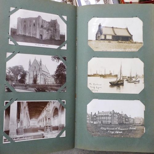 802 - Three albums of Victorian and Edwardian postcards including photographic, song cards, a small tin of... 