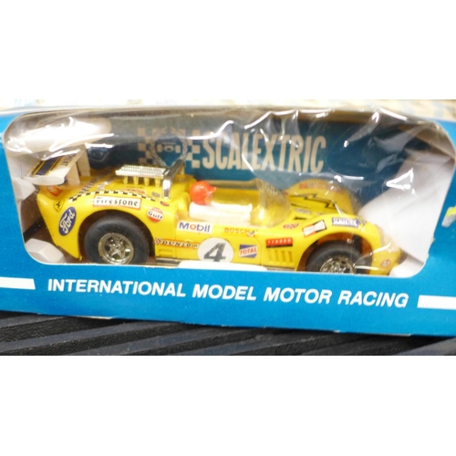 808 - Vintage Scalextric, two International Model Motor Racing cars, track, transformer, etc.