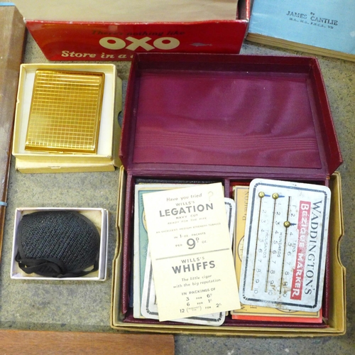 831 - A box of assorted items, a collar box, a 1950's motor fuel ration book, a pair of scissors, a leathe... 