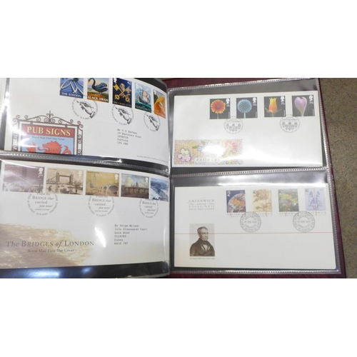 855 - Stamps:- Royal Mail First Day Cover album containing sixty first day covers, mainly with special can... 