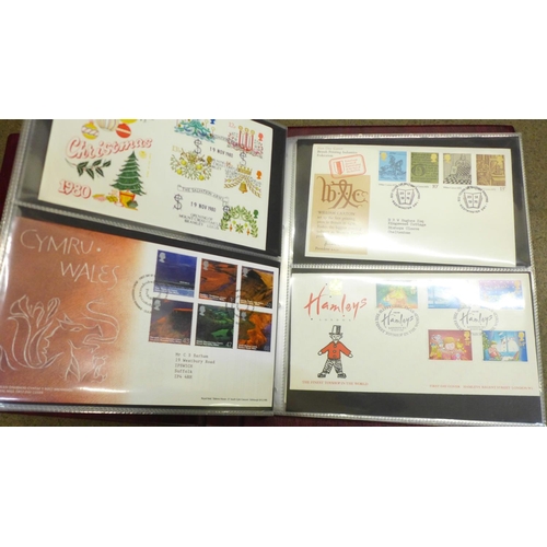 855 - Stamps:- Royal Mail First Day Cover album containing sixty first day covers, mainly with special can... 